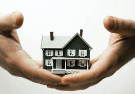 two hands holding lease to own home