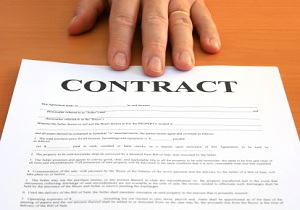 rent to own contract in mans hand